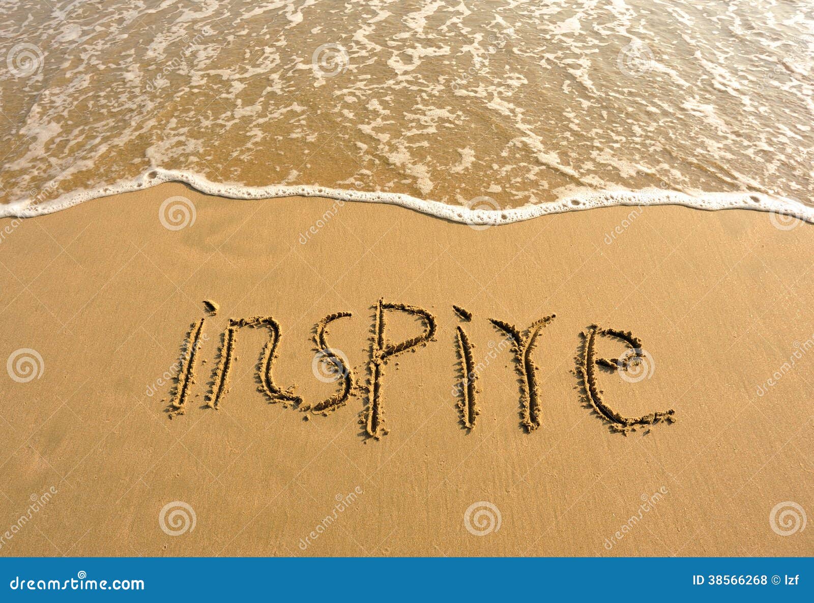 inspire drawn on the beach