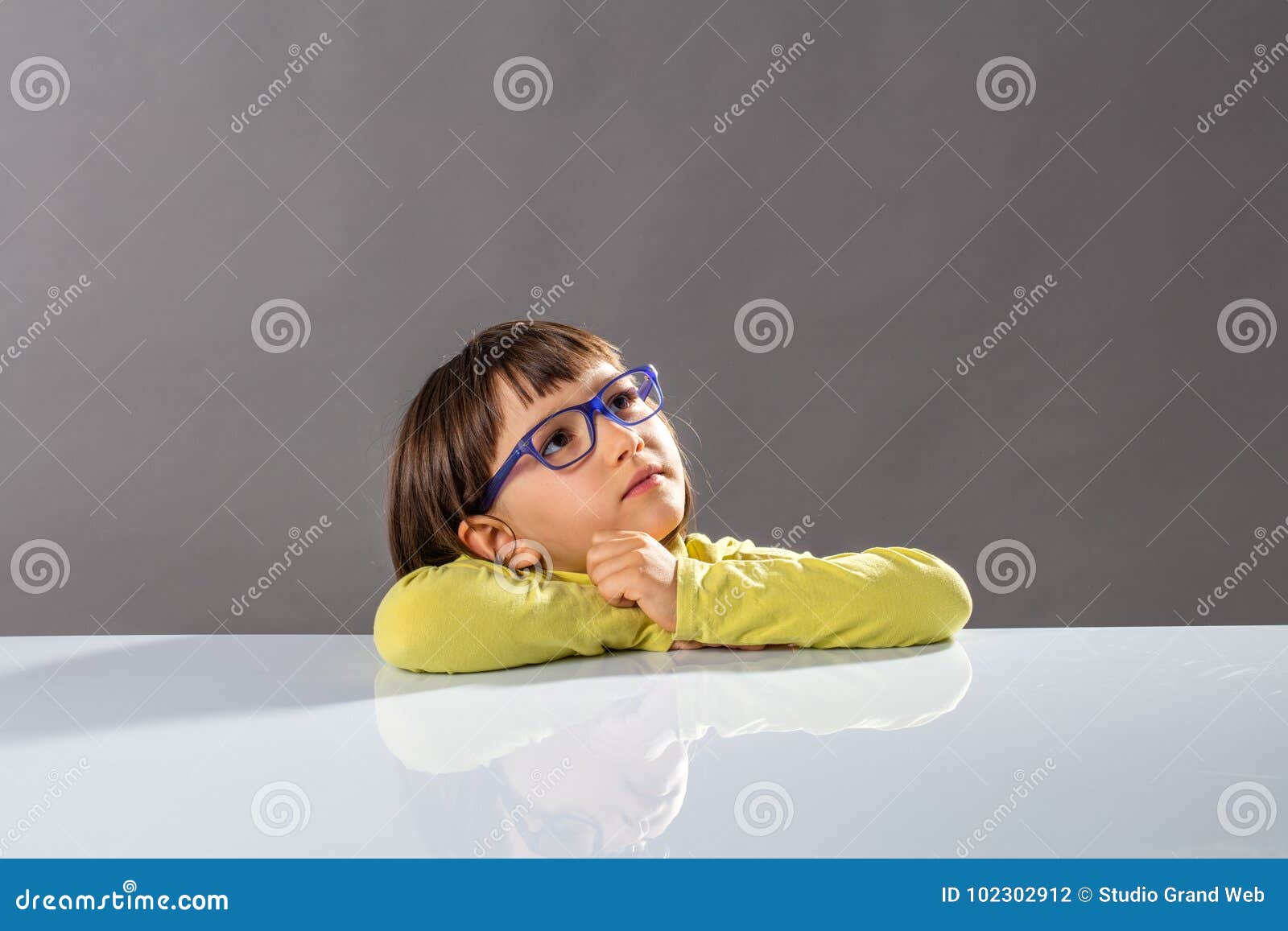 inspired smart child looking away towards smart future, copy space
