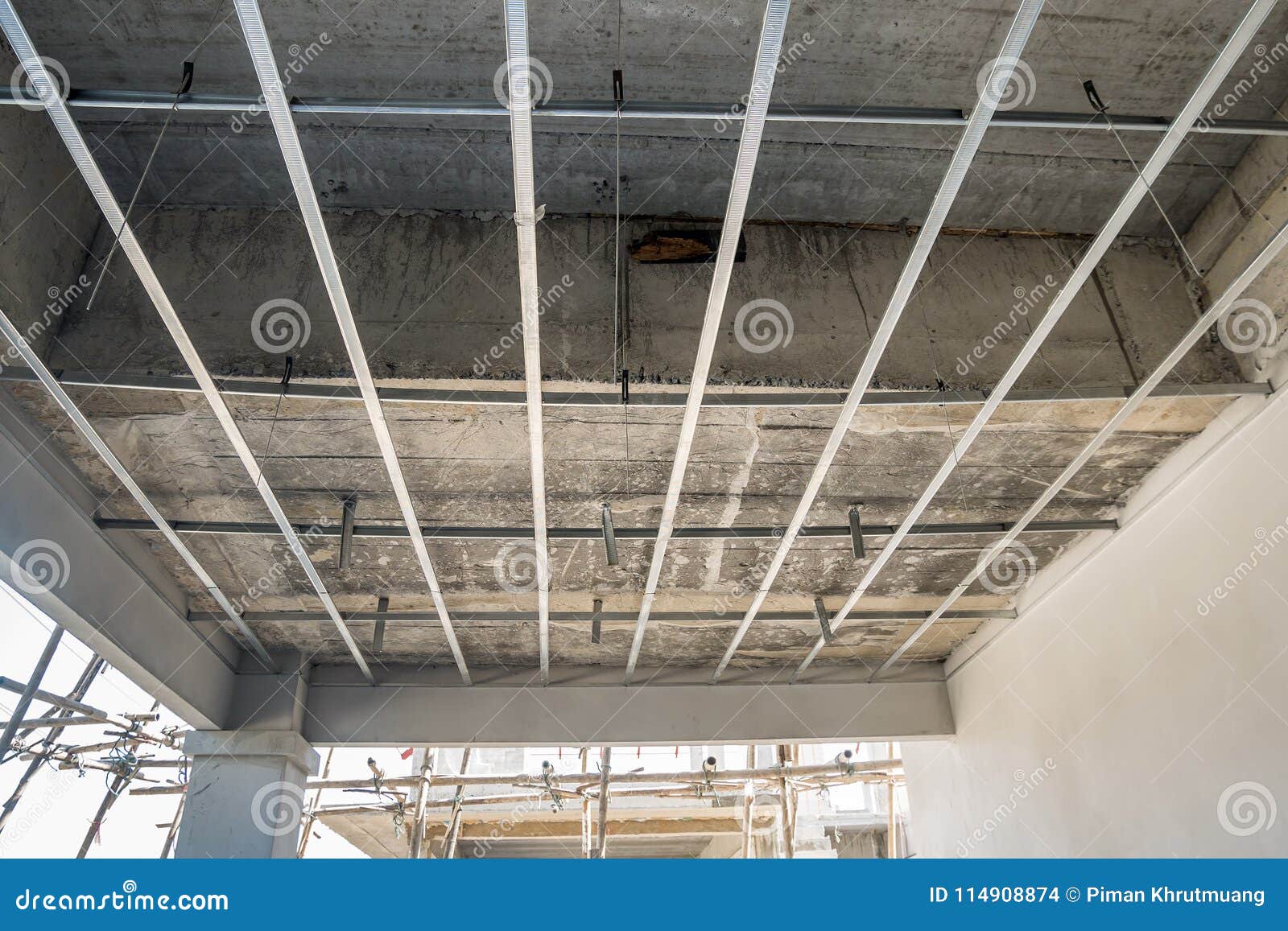 Install Metal Frame For Plaster Board Ceiling At House Stock Photo