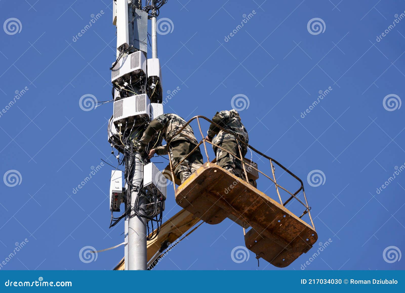 Installation of Cellular Equipment on the Tower. Two Communications