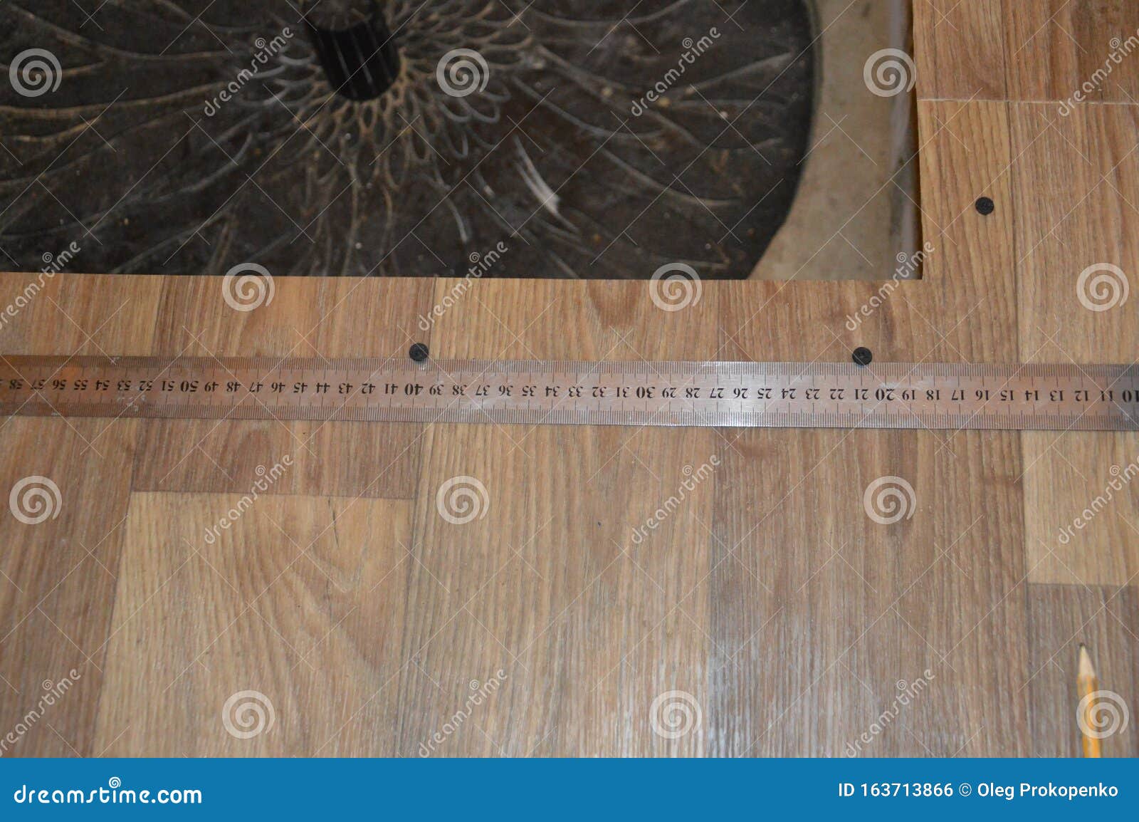 Installation of Floor Skirting Boards on the Floor and Linoleum Stock