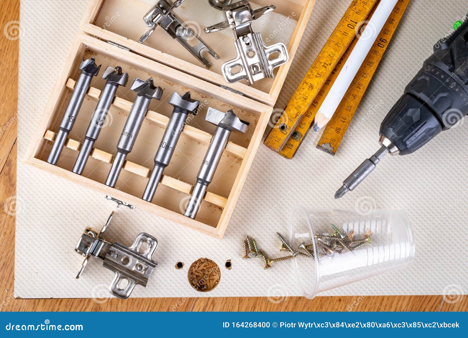 Installation Of Furniture Hinges In The Kitchen Cabinet Door