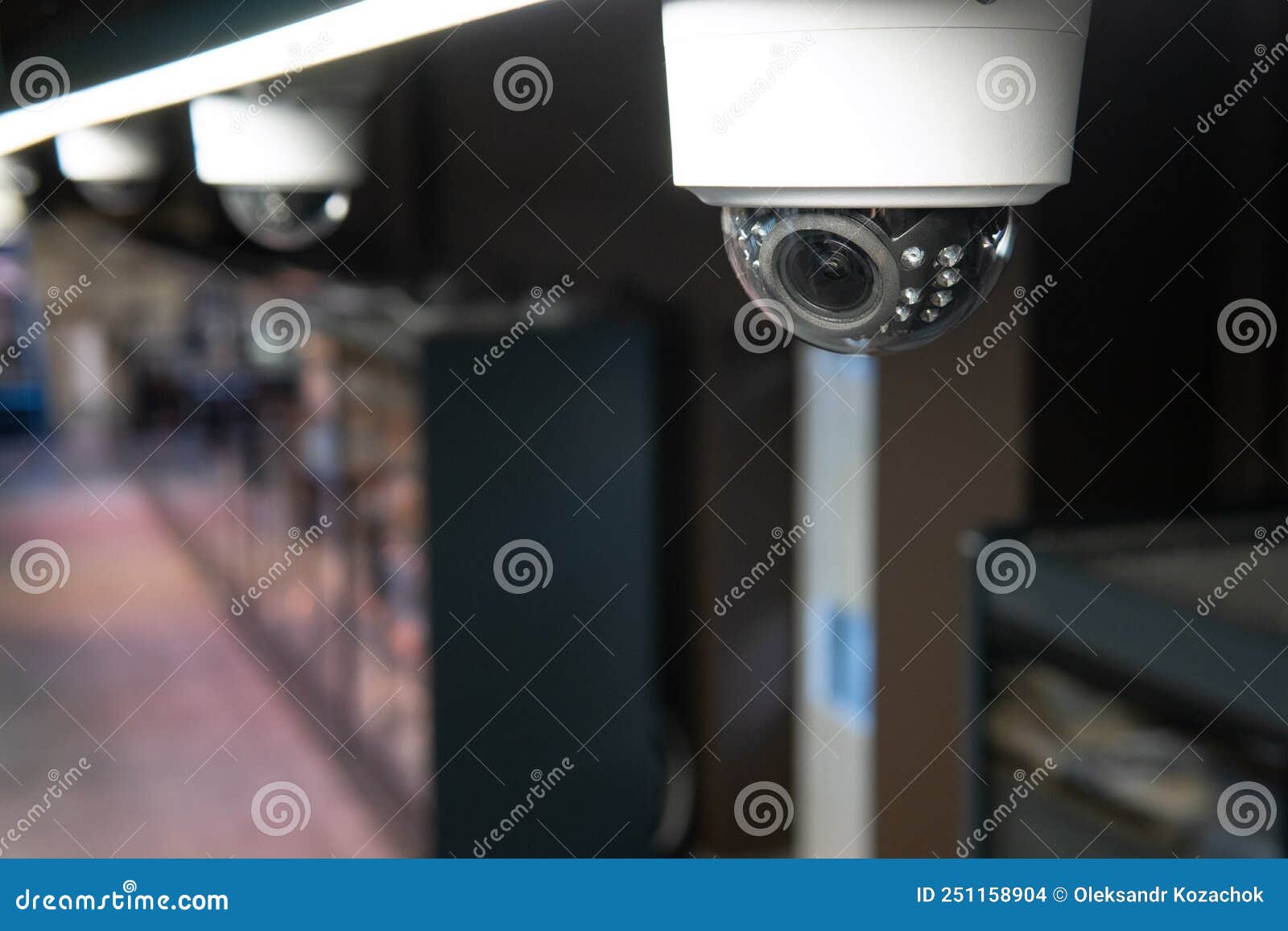 Installation of Indoor Video Surveillance Systems. Closeup Stock Photo