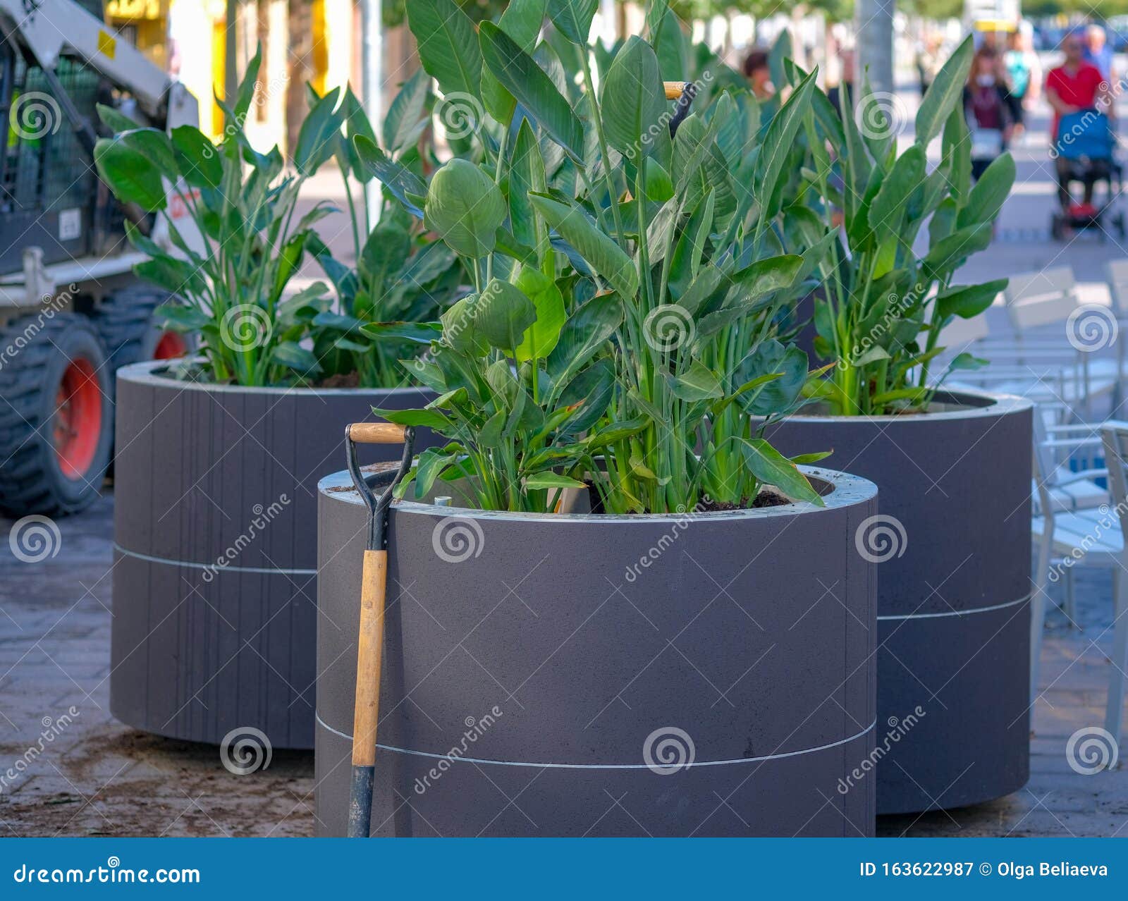 Installation Of Large Pots For Plants On The Main Street Stock