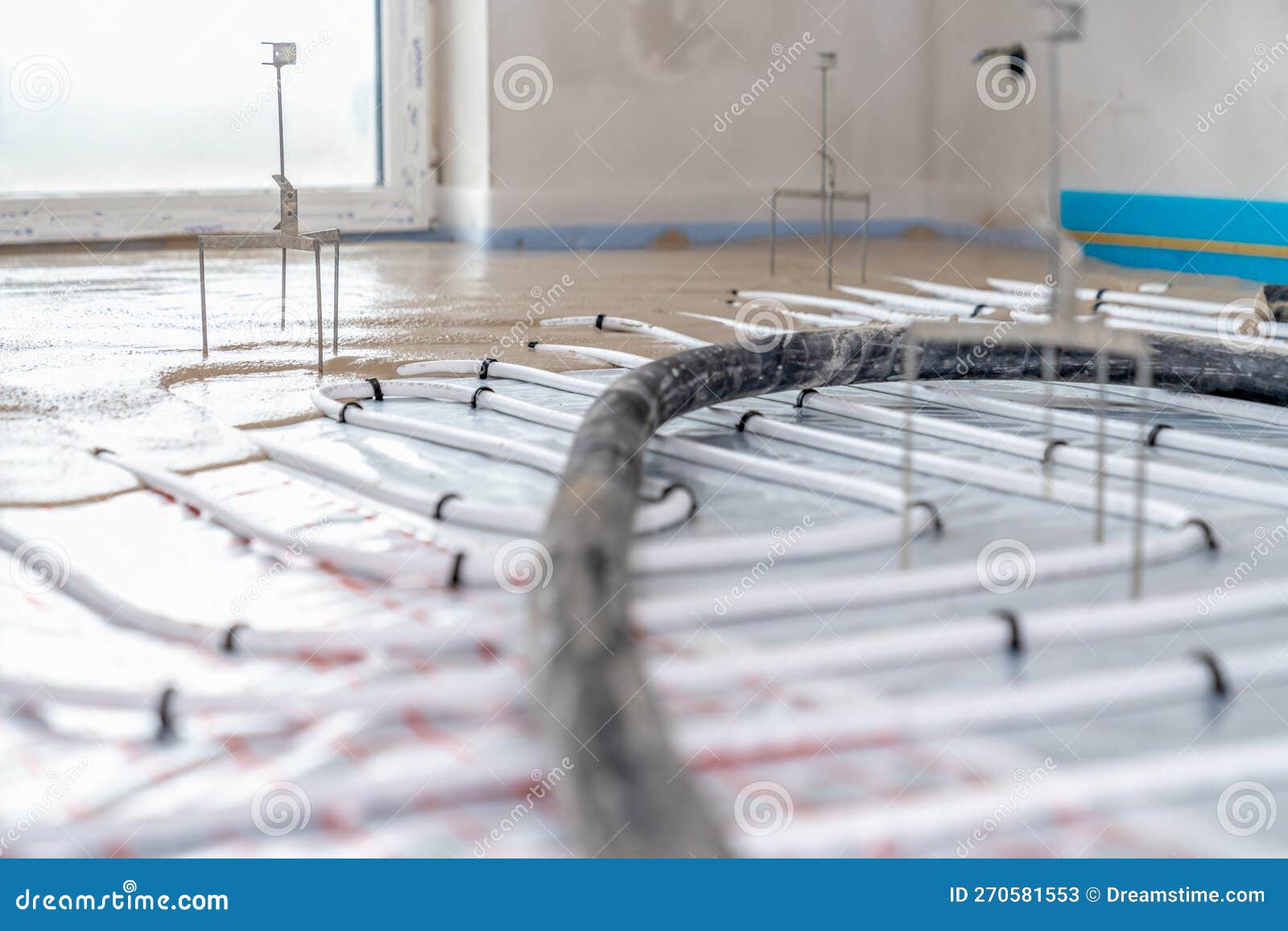 Installation of Liquid Concrete on the Floor for Underfloor Heating