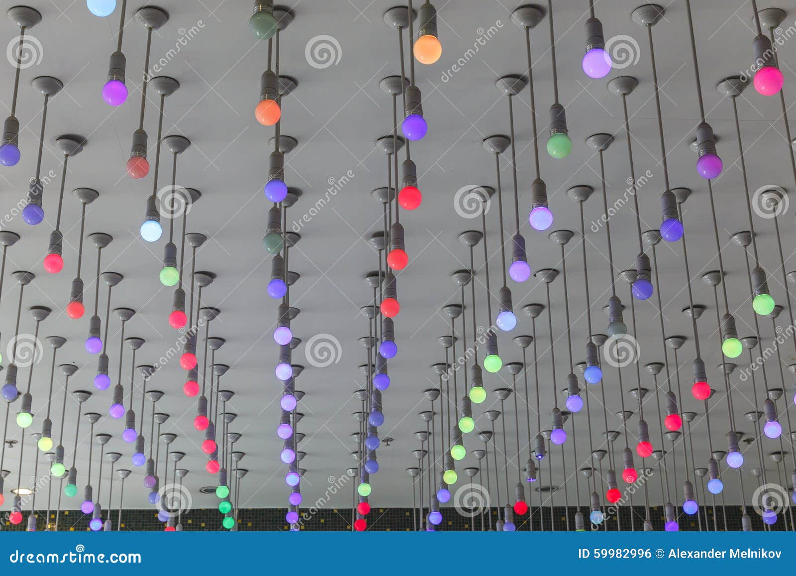 installation of multi-colored light bulbs on the ceiling