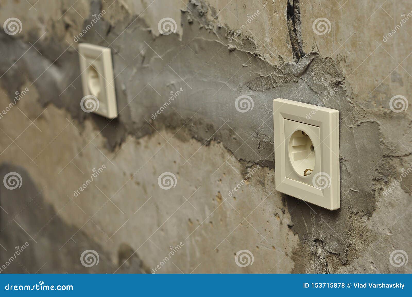 Installation of Outlets during Repair in Fresh Concrete Empty Walls