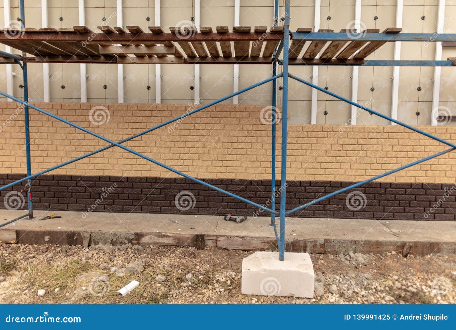 Installation of Plastic Siding Under the Brick Stock Image Image of