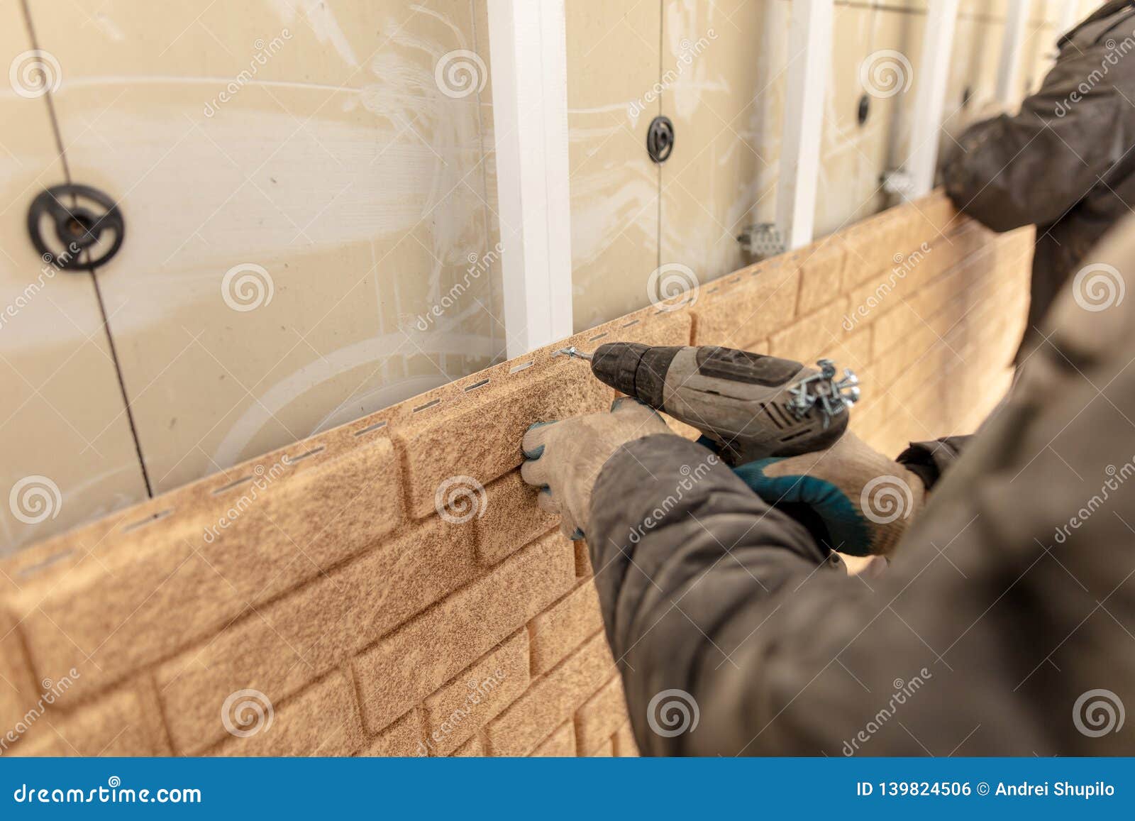 Installation of Plastic Siding Under the Brick Stock Photo Image of