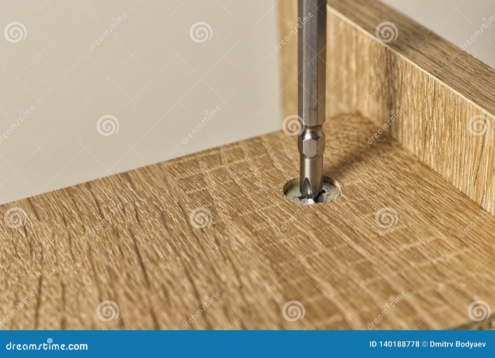 Installation in the Socket of the Threaded Furniture Fastener Stock