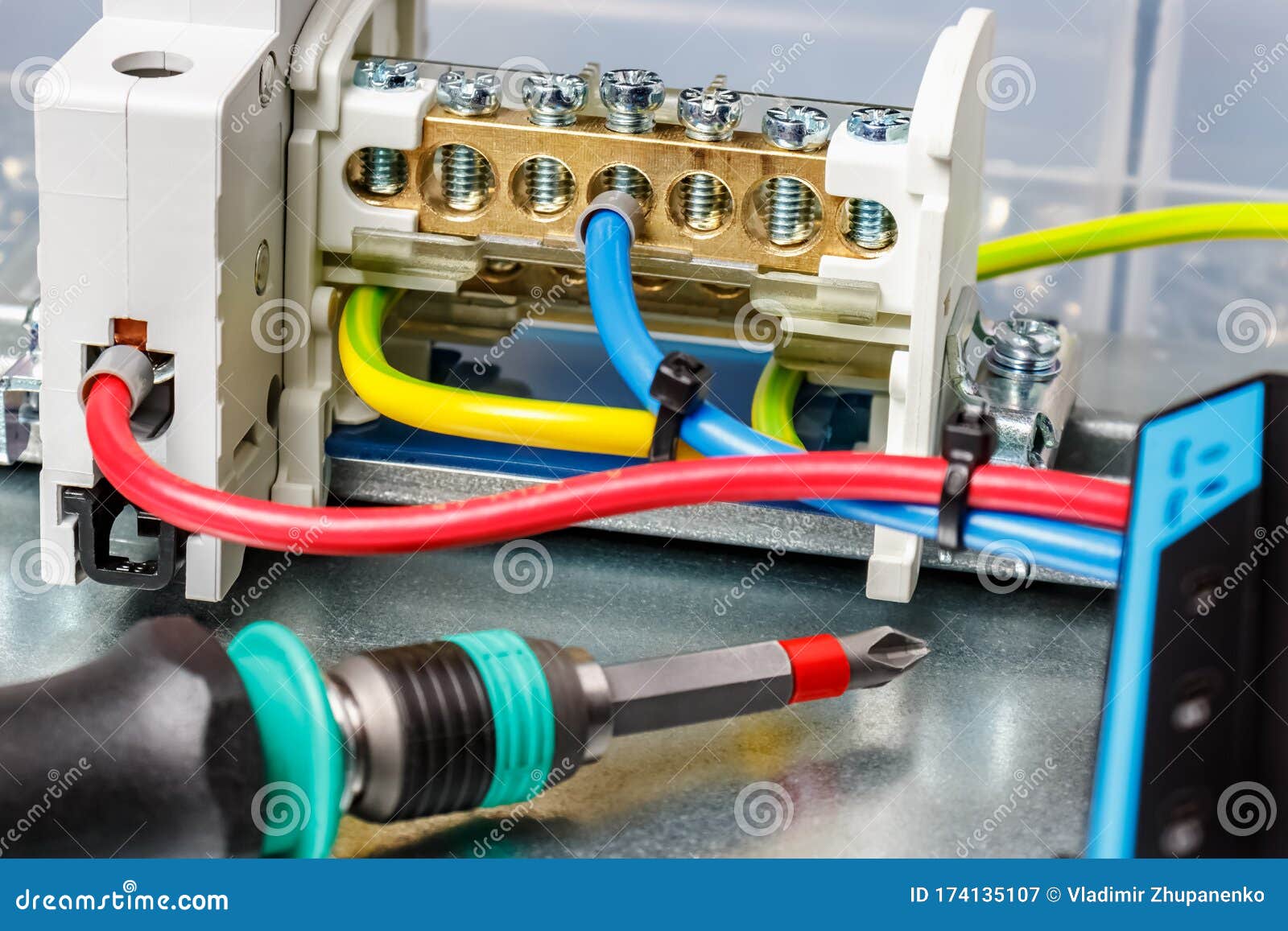 Installed Wire Terminal on Metal Mounting Plate of Electrical Panel