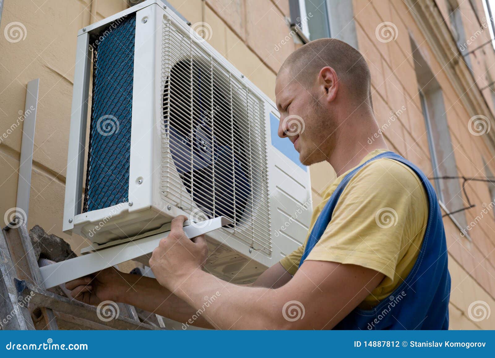 Installer Sets A New Air Conditioner Stock Photo Image of adjuster