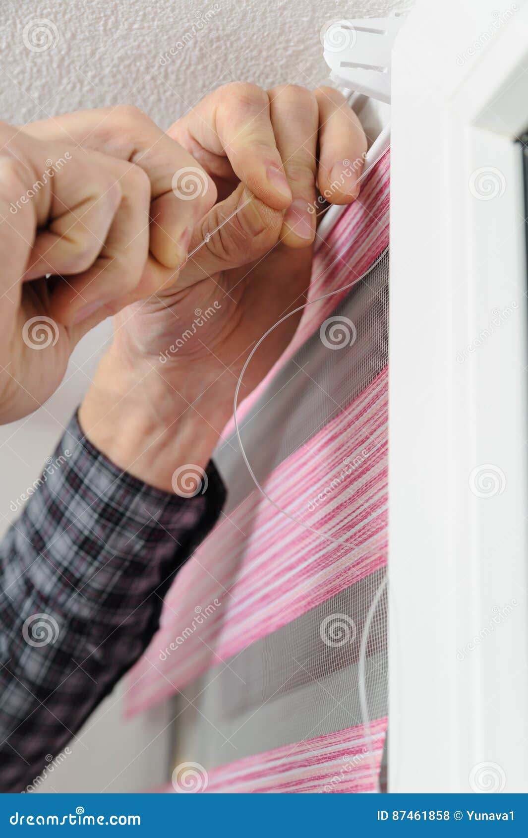 Installing Fabric Roller Blinds. Stock Photo Image of striped