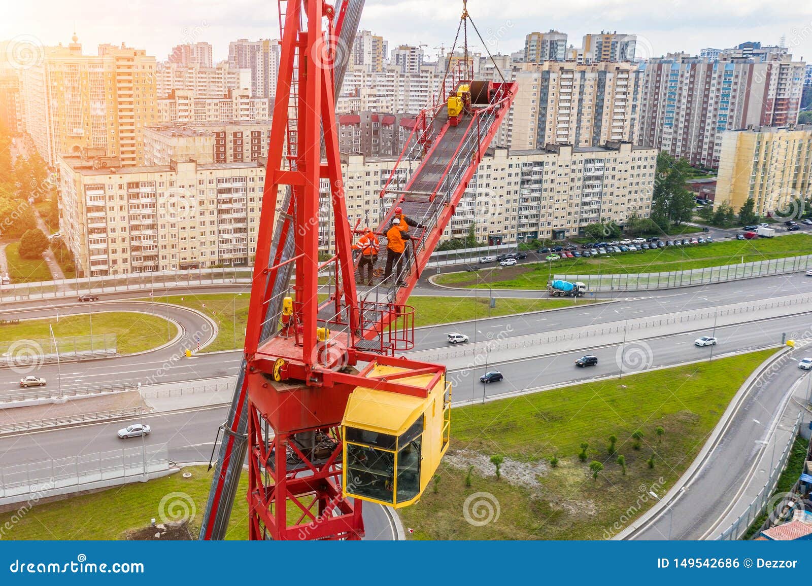 Installing the Jib of a Construction Crane Using Another Crane on the