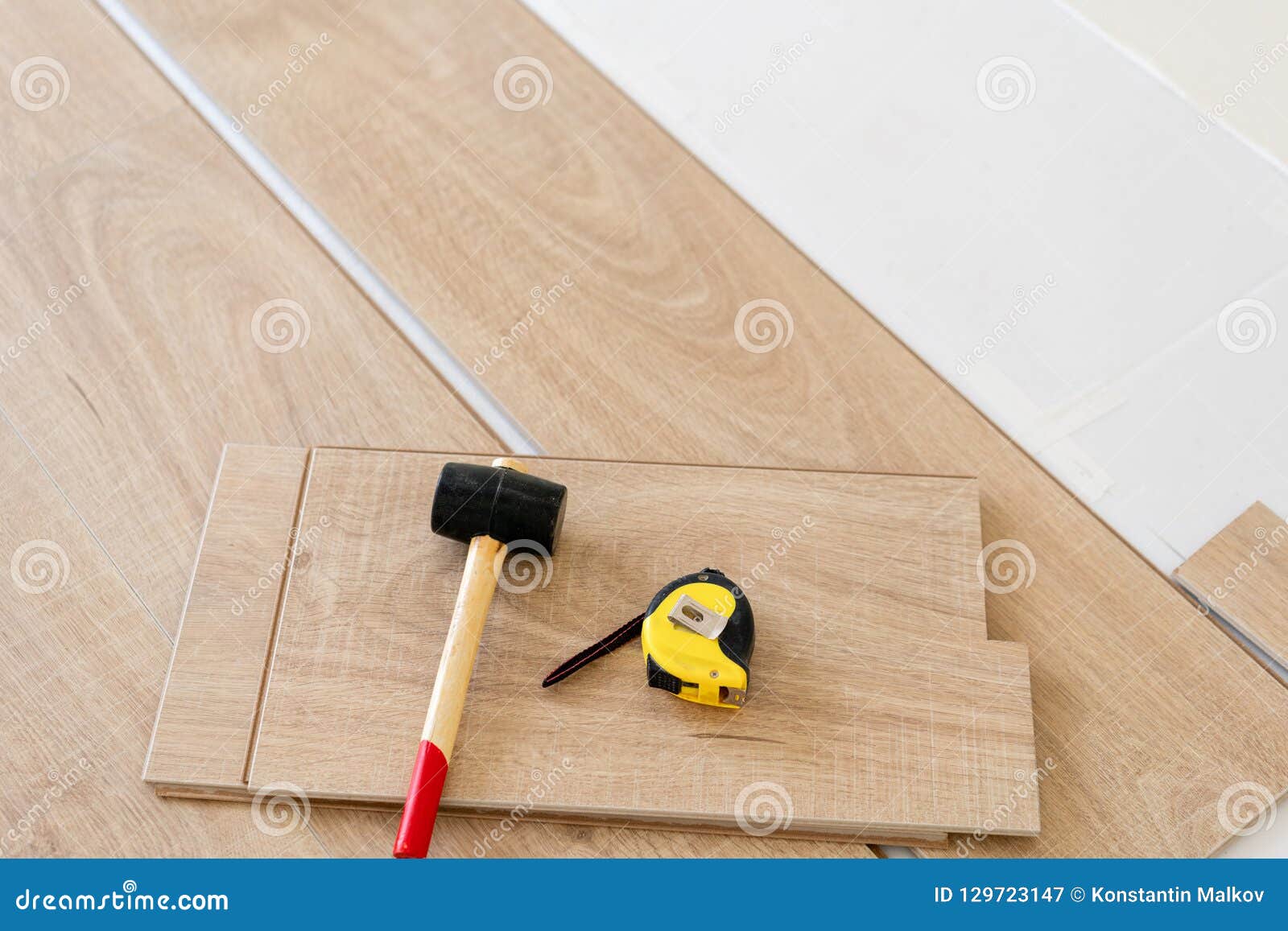 Installing Laminate Parquet In Interior On The Floor Lie