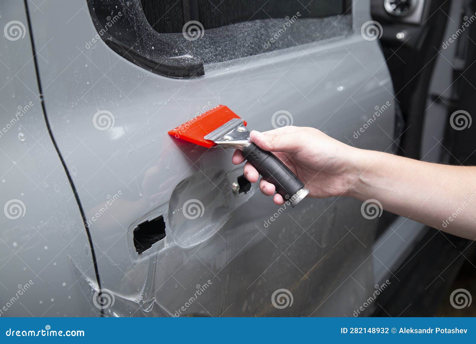 Installing a Protective Film on the Car.Transparent Paint Protection Stock Photo Image of