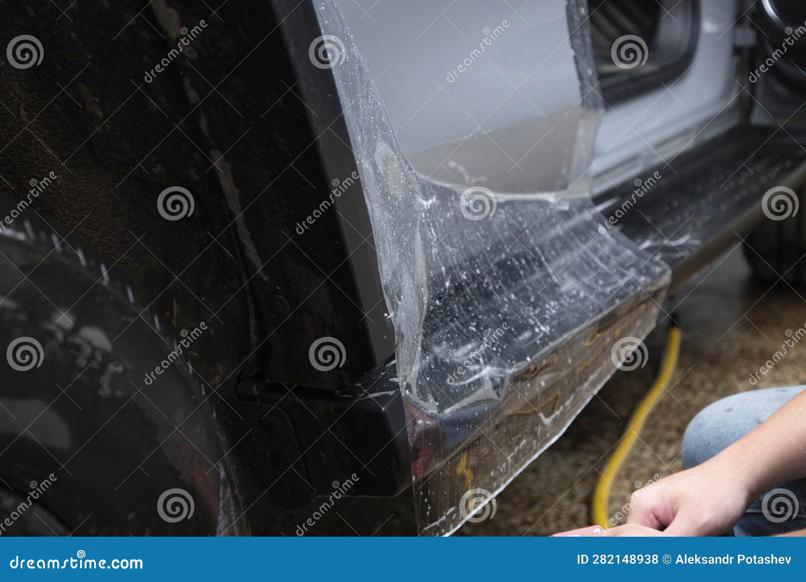 Installing a Protective Film on the Car.Transparent Paint Protection Stock Photo Image of