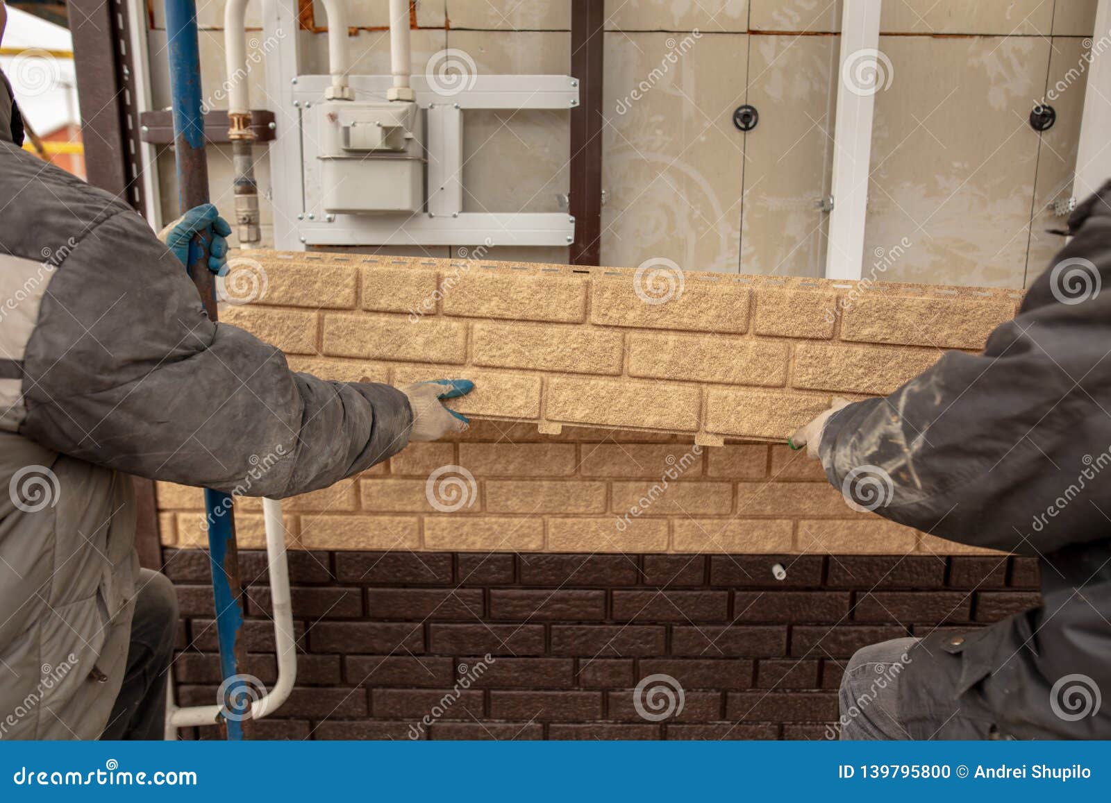 Installation of Plastic Siding Under the Brick Stock Photo Image of