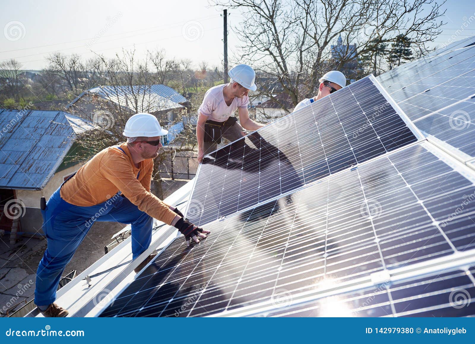 Installing Solar Photovoltaic Panel System On Roof Of House Stock Photo Image of installer