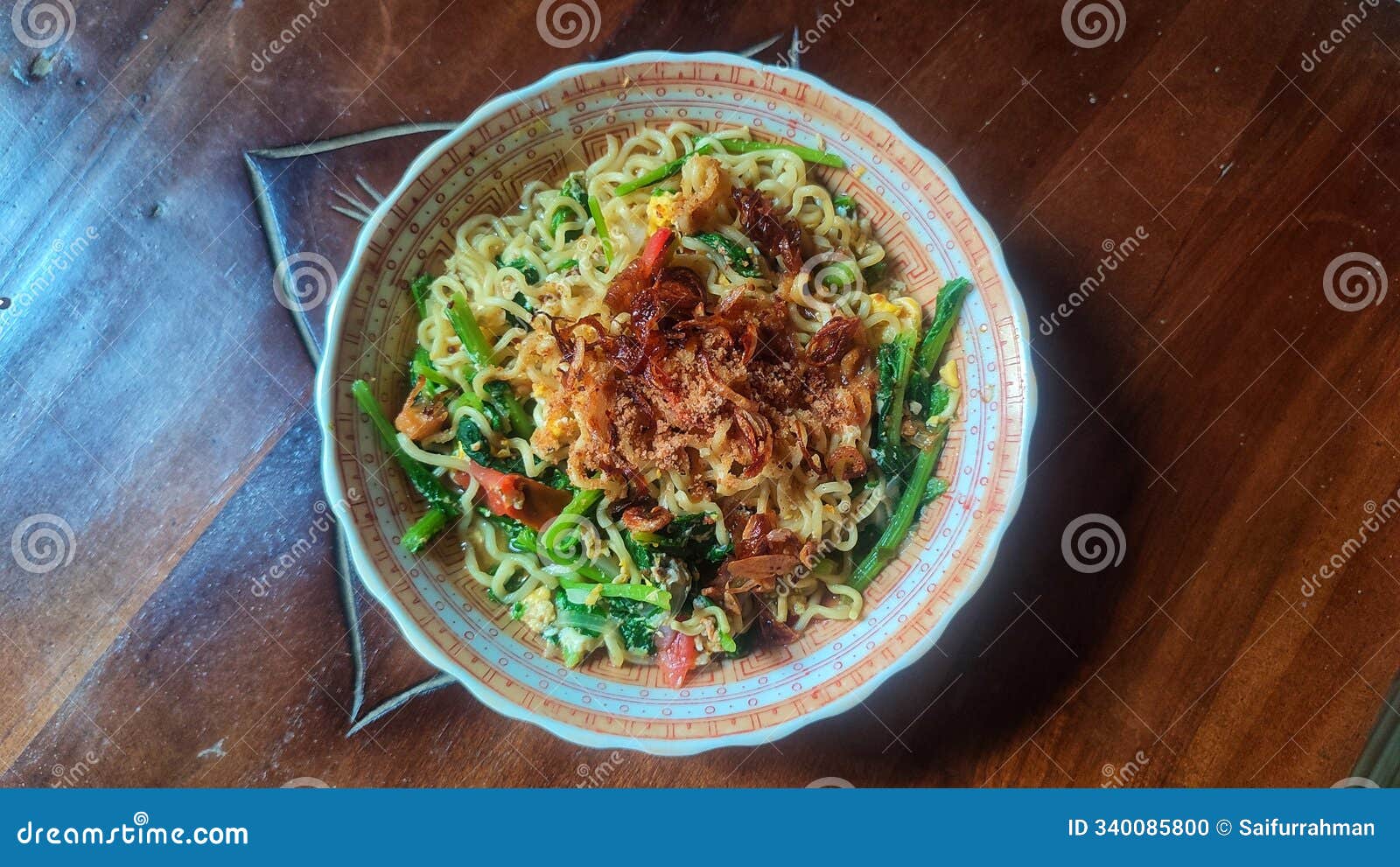instant noodles filled with vegetable toppings and fried onions