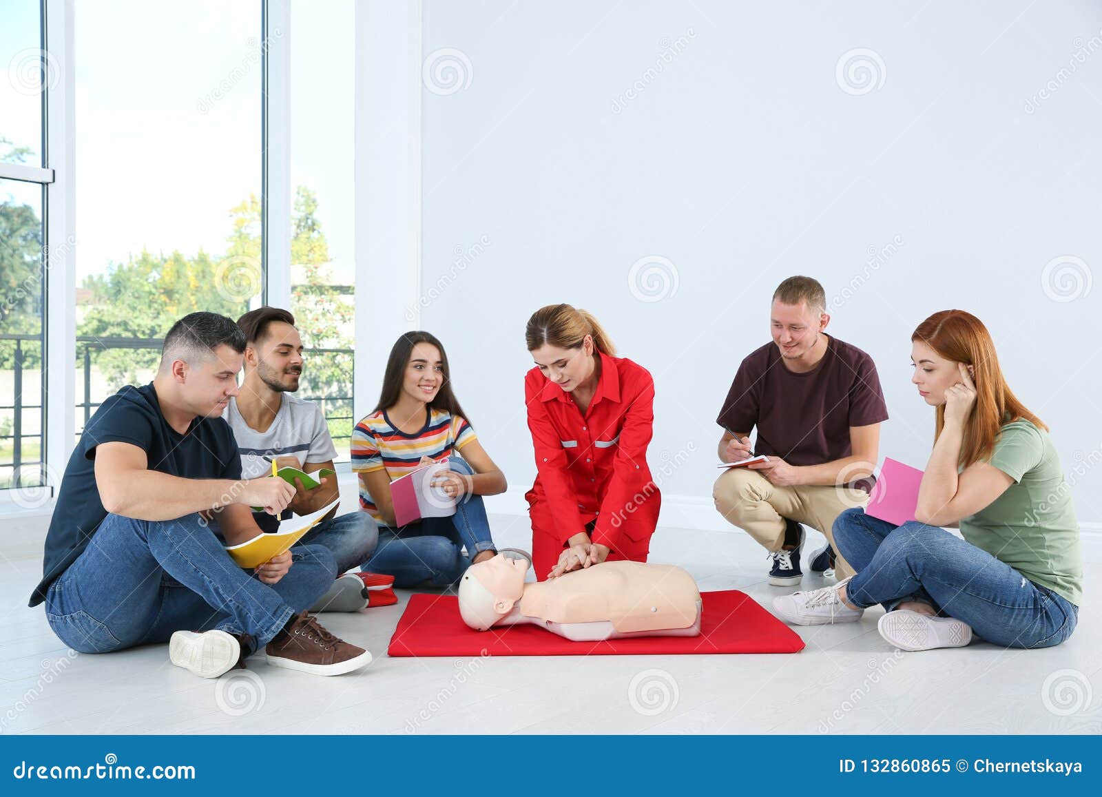 Instructor Demonstrating CPR on Mannequin Stock Image Image of