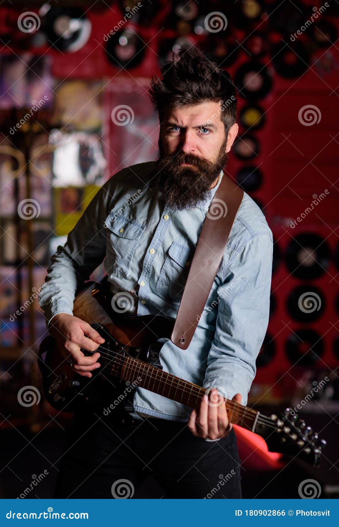 instrumentalist concept. musician with beard play electric guitar musical instrument.