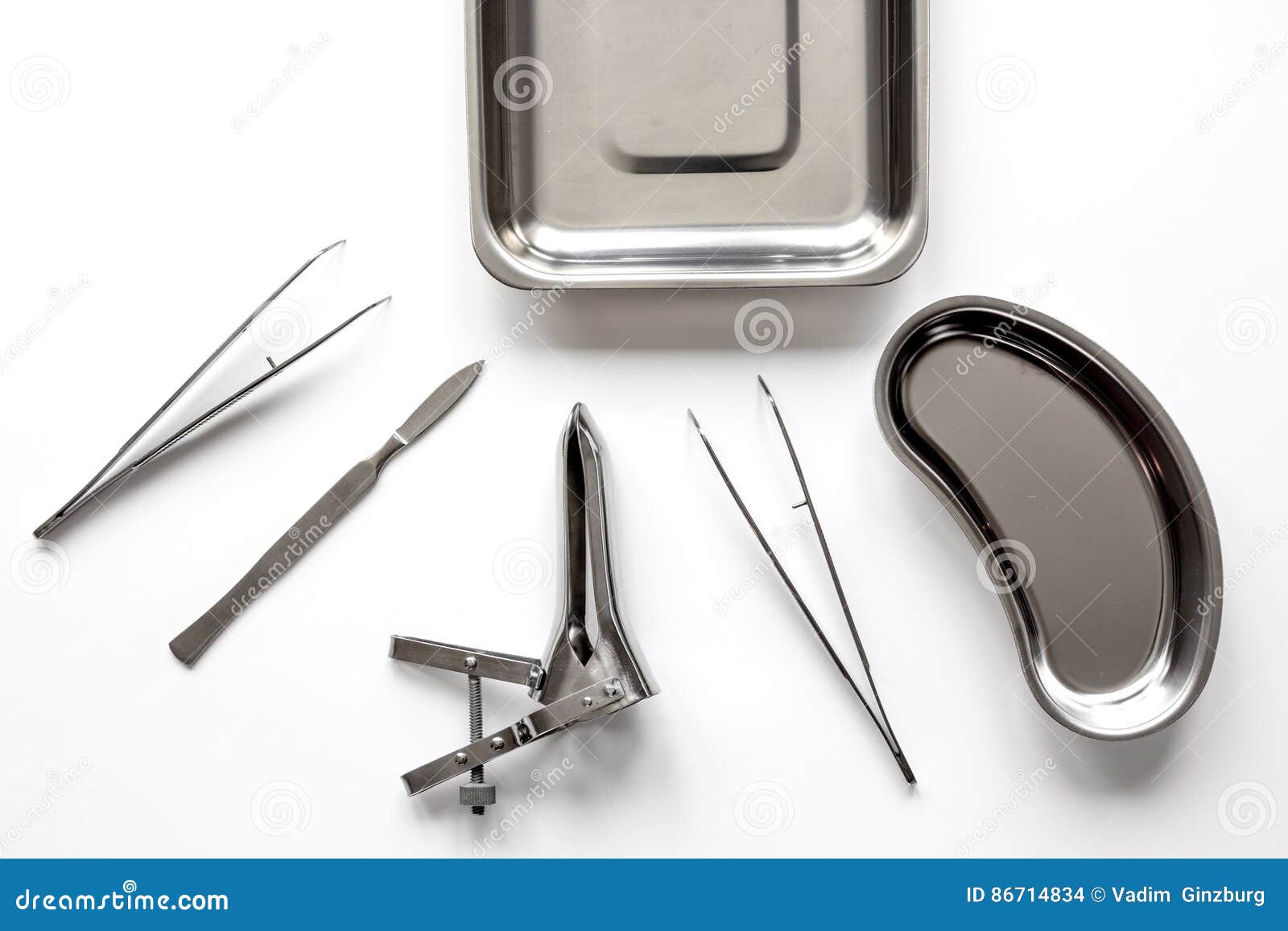 Instruments of Gynecologist on White Background Top View Stock Photo