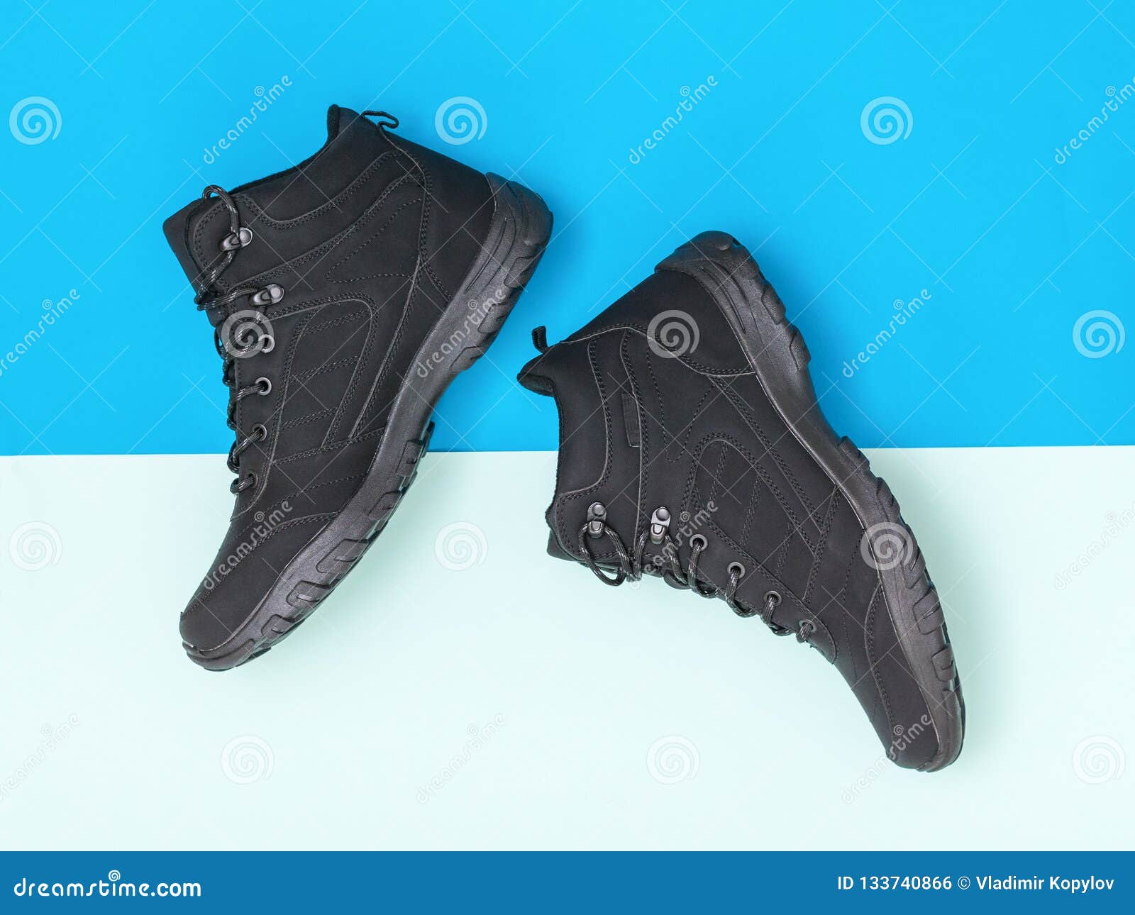 Insulated Black Casual Sport Men`s Shoes on Blue and Blue Background ...