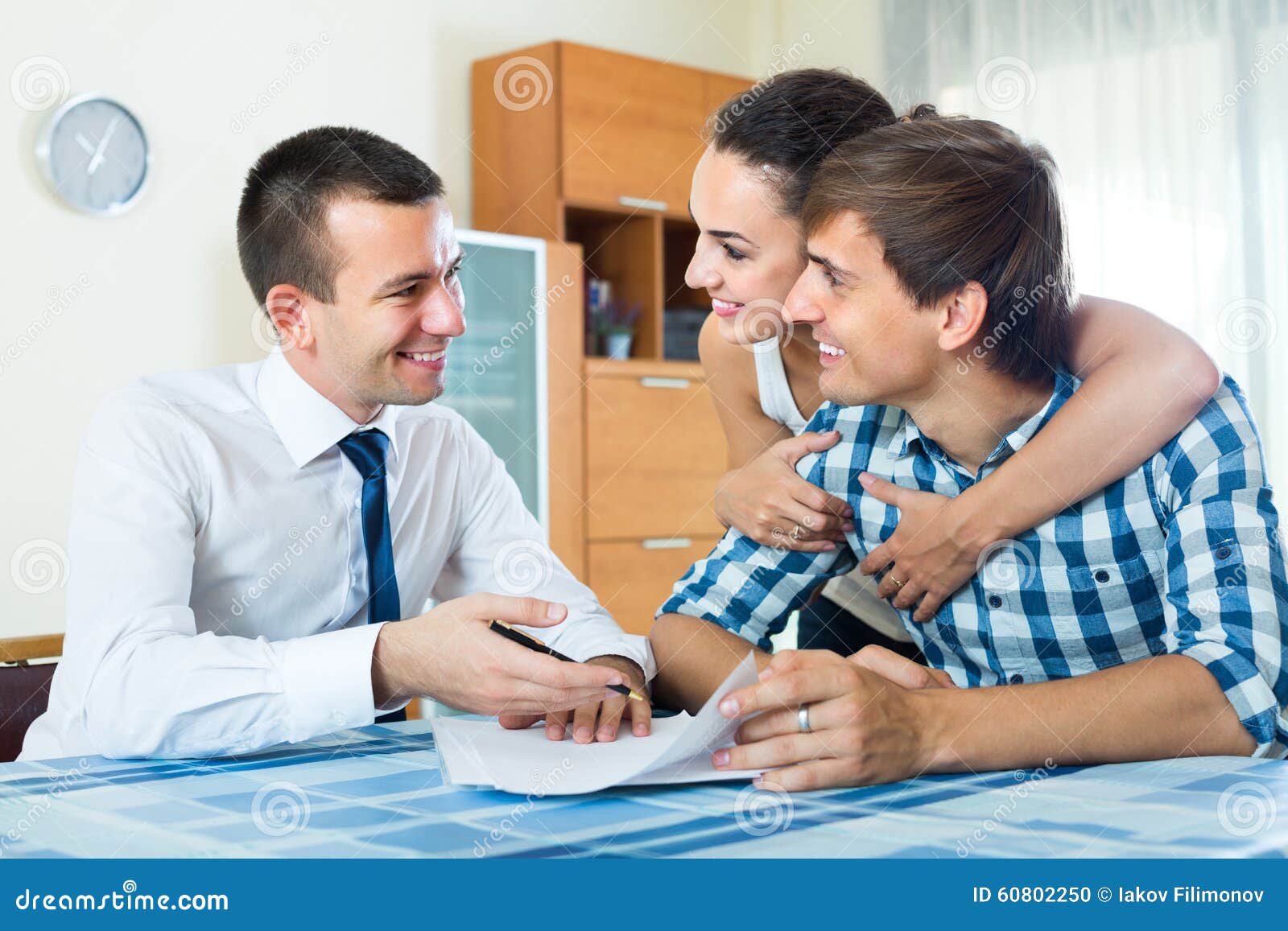 Insurance Agent And Couple Indoors Stock Photo - Image ...