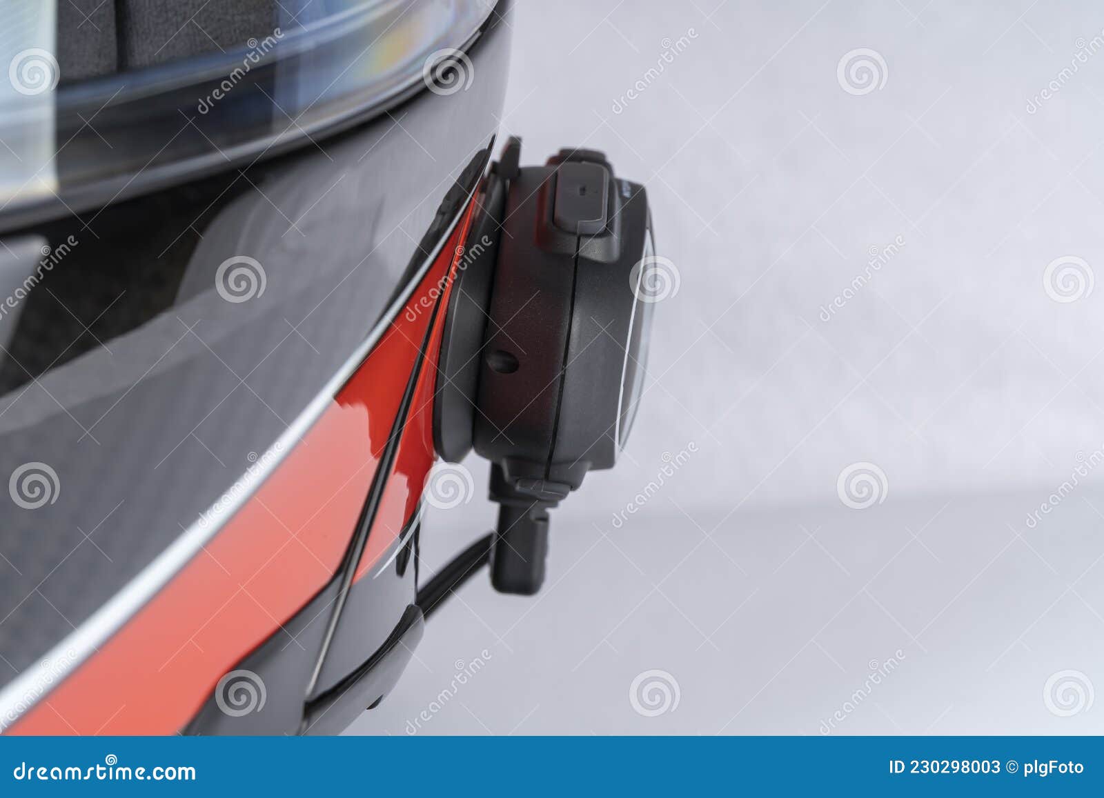 An Intercom Put on a Motorcycle Helmet Isolated on White Stock Image