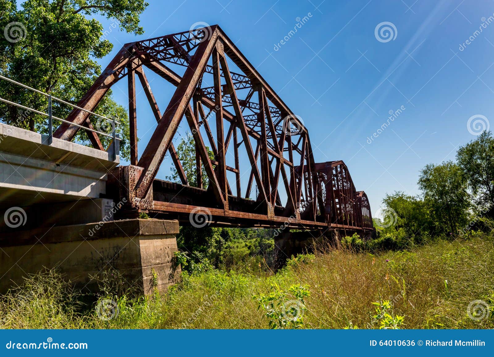 An Interesting View of an Old Iconic Iron Truss Railroad Bridge Stock
