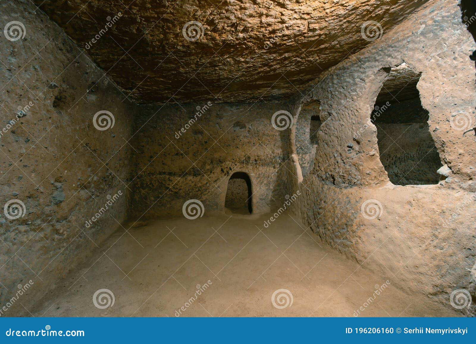 the interior of an ancient underground city on the territory of cappadocia. rooms deep underground. the concept of tourism and