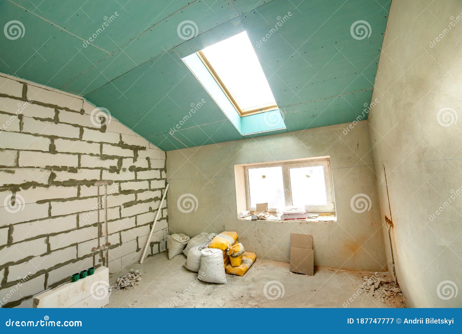 Interior of an Apartment Room with Bare Walls and Ceiling Under