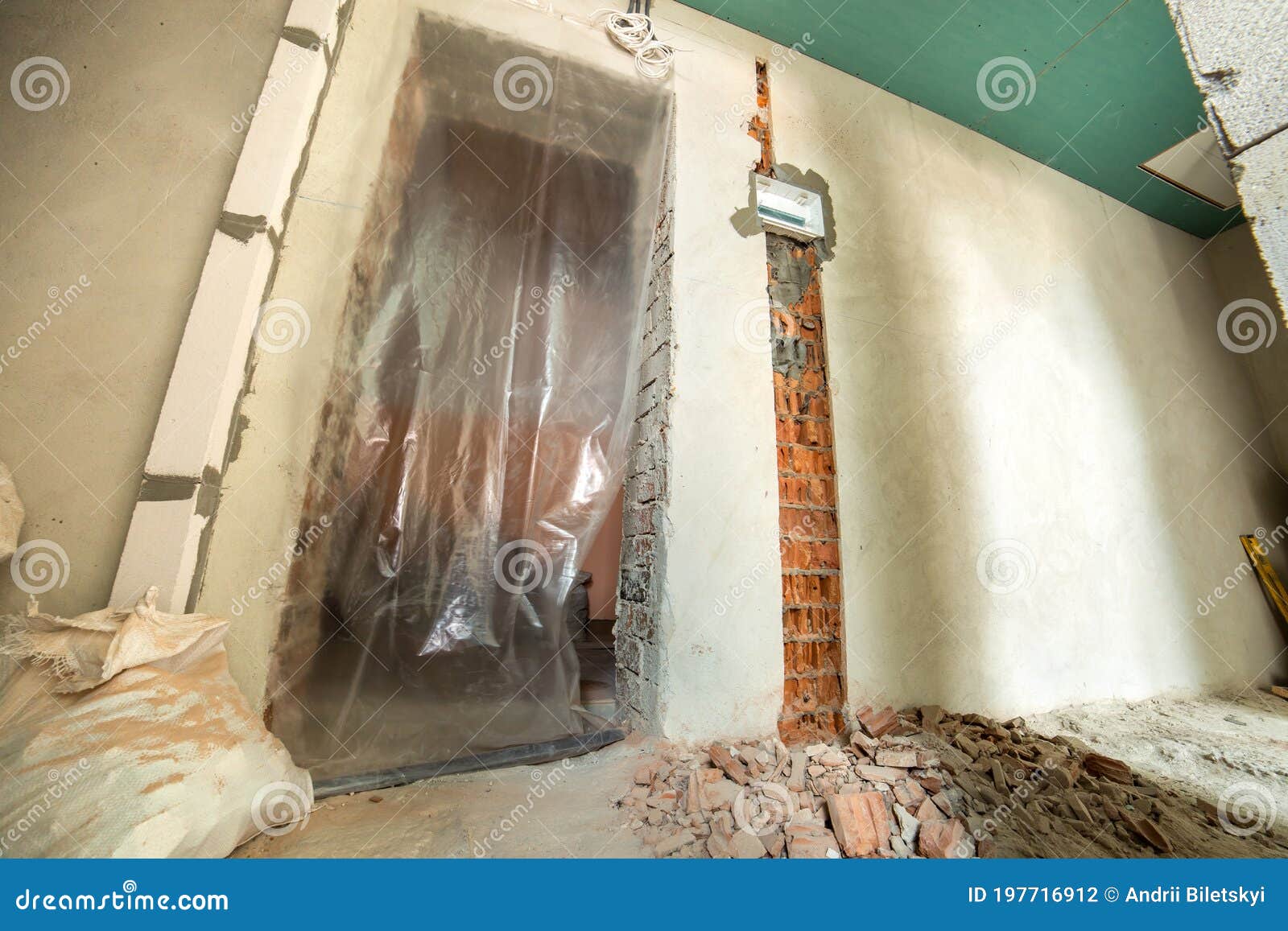 Interior of an Apartment Room with Bare Walls and Ceiling Under