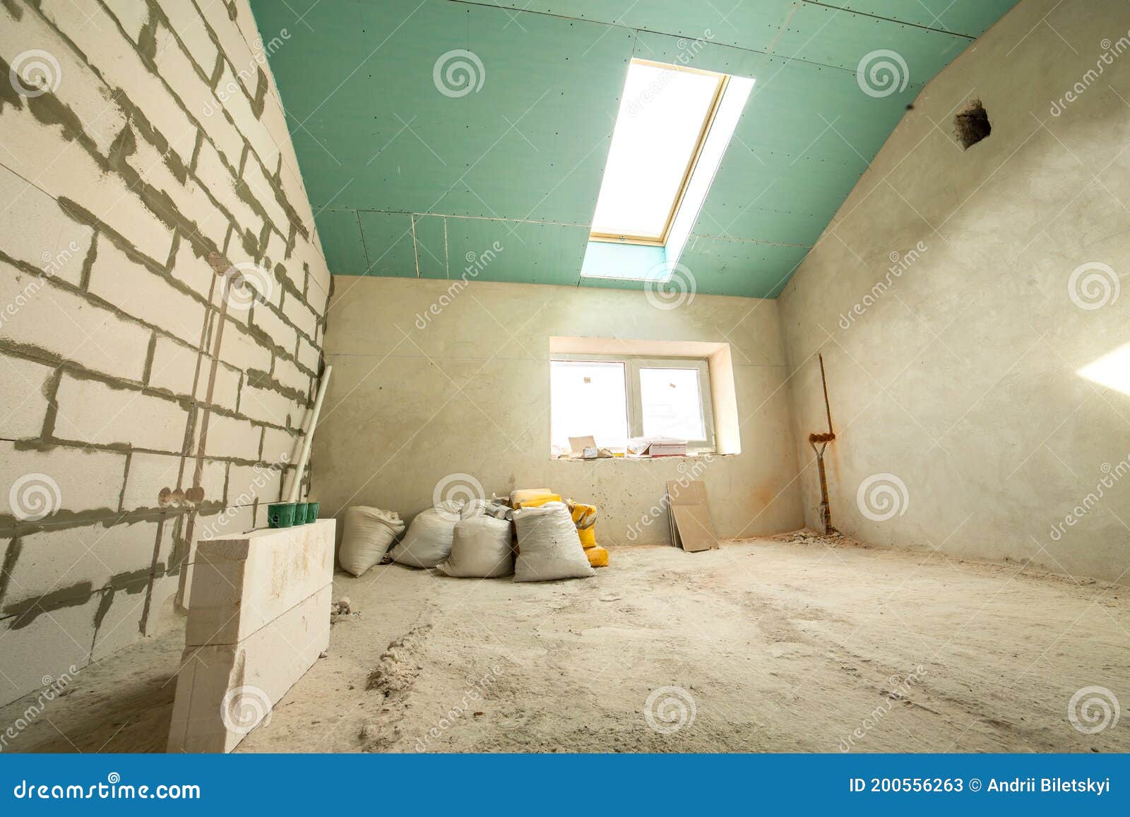 Interior of an Apartment Room with Bare Walls and Ceiling Under