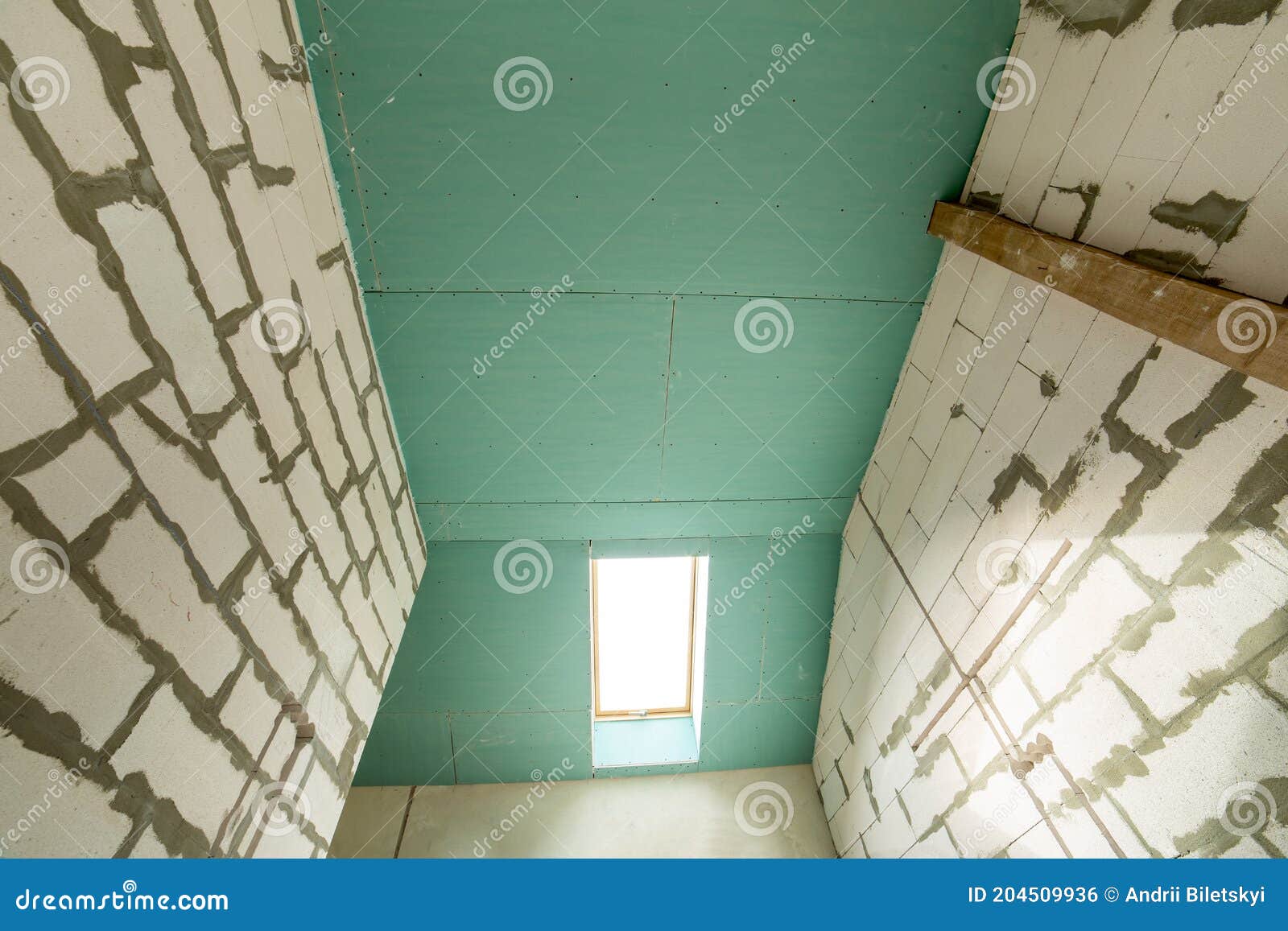 Interior of an Apartment Room with Bare Walls and Ceiling Under