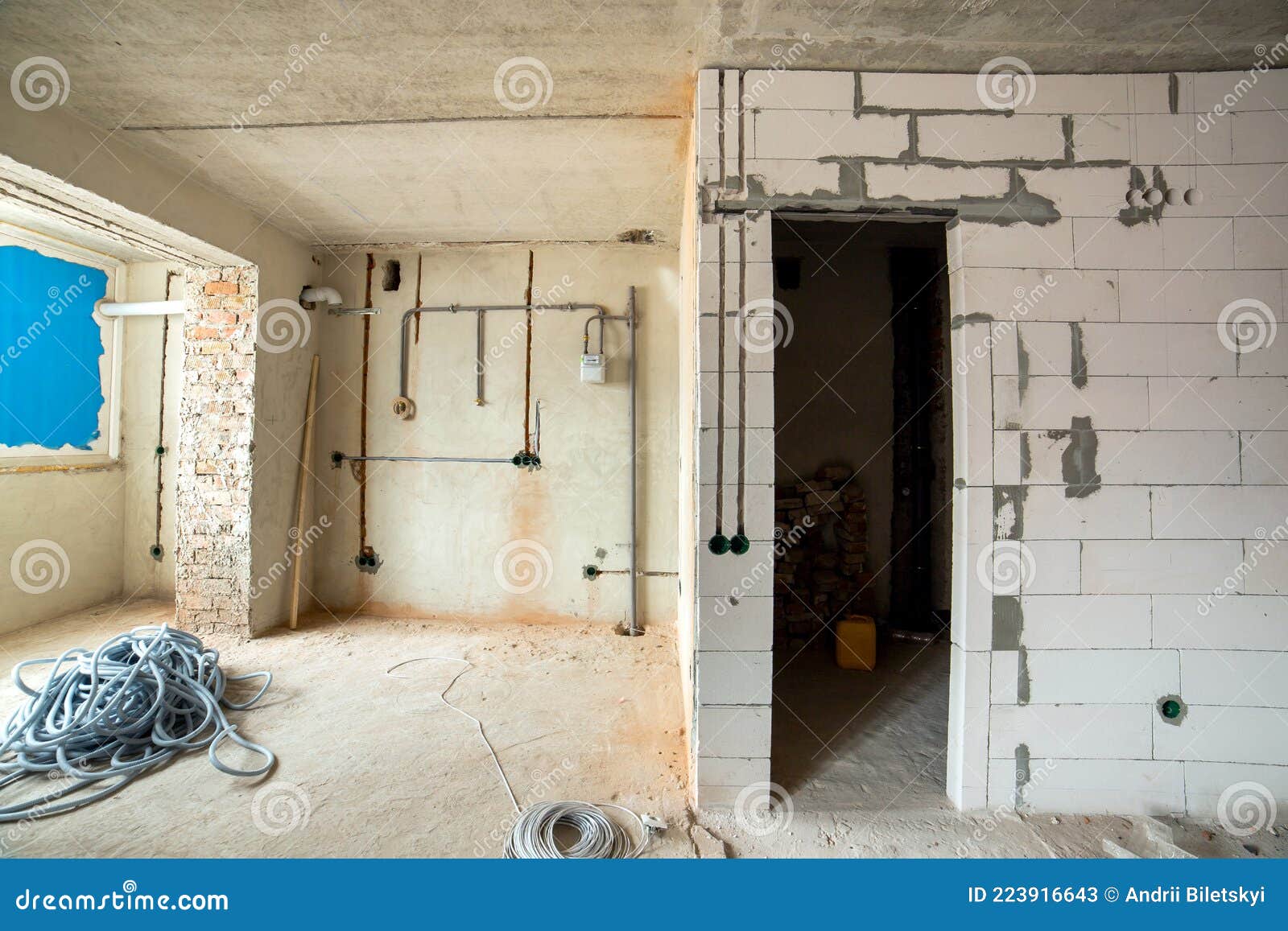 Interior of an Apartment Room with Bare Walls and Ceiling Under