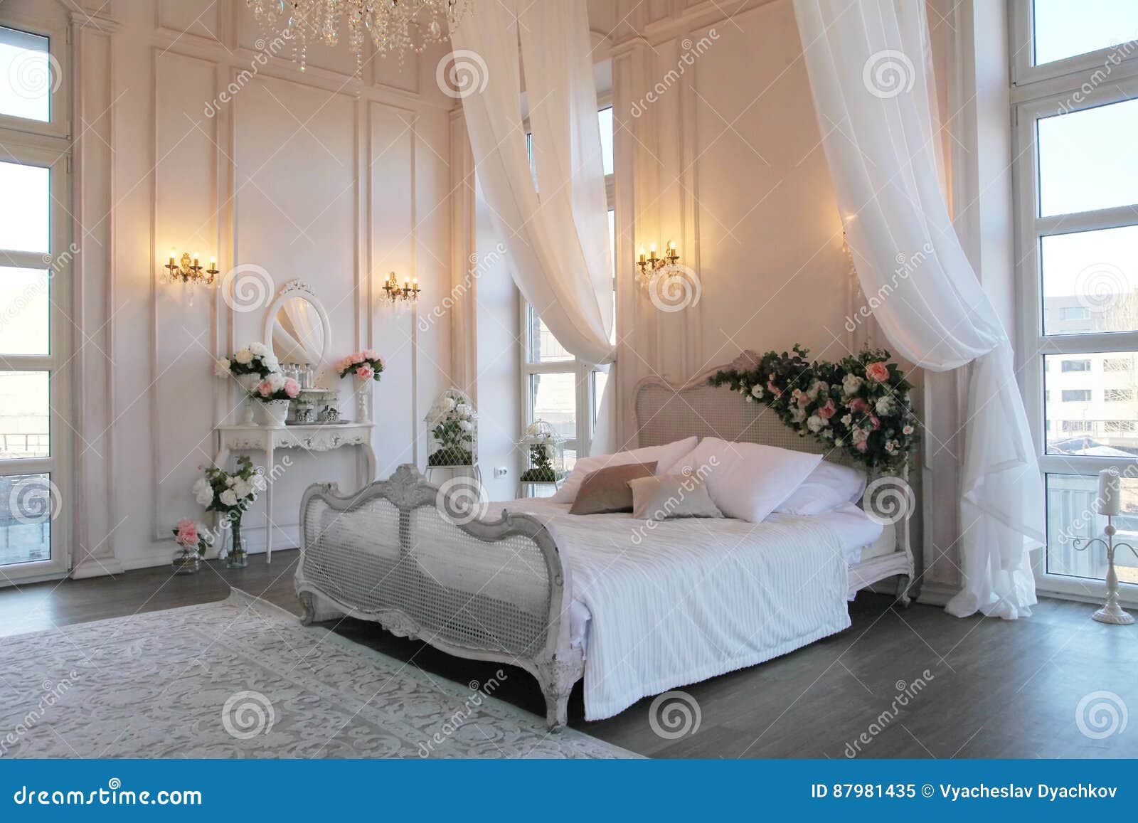 The Interior Of A Beautiful Bedroom Suite In Bright White