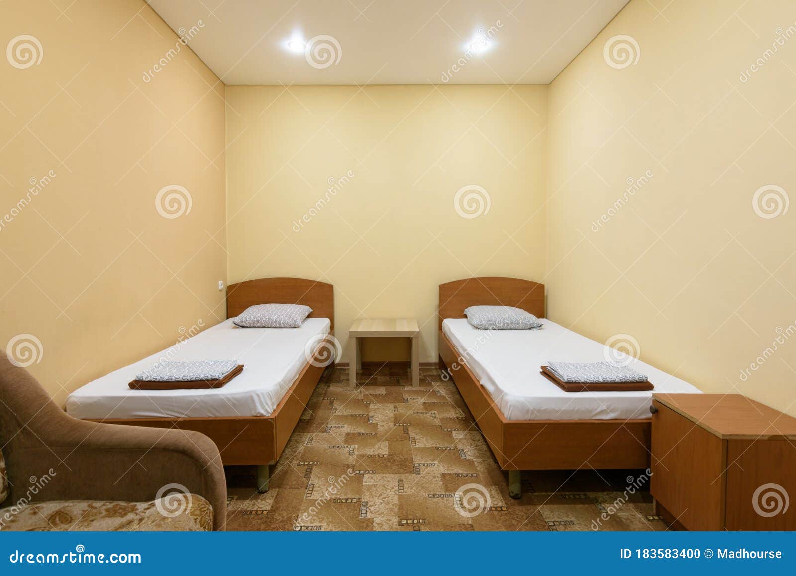 The Interior of a Budget Hotel Room with Two Beds Stock Photo Image