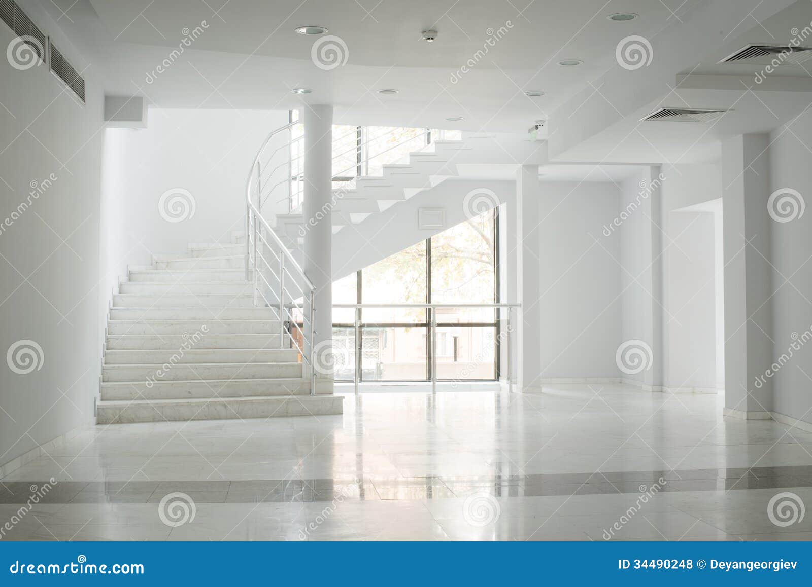 Interior Of A Building With White Walls Stock Photo Image