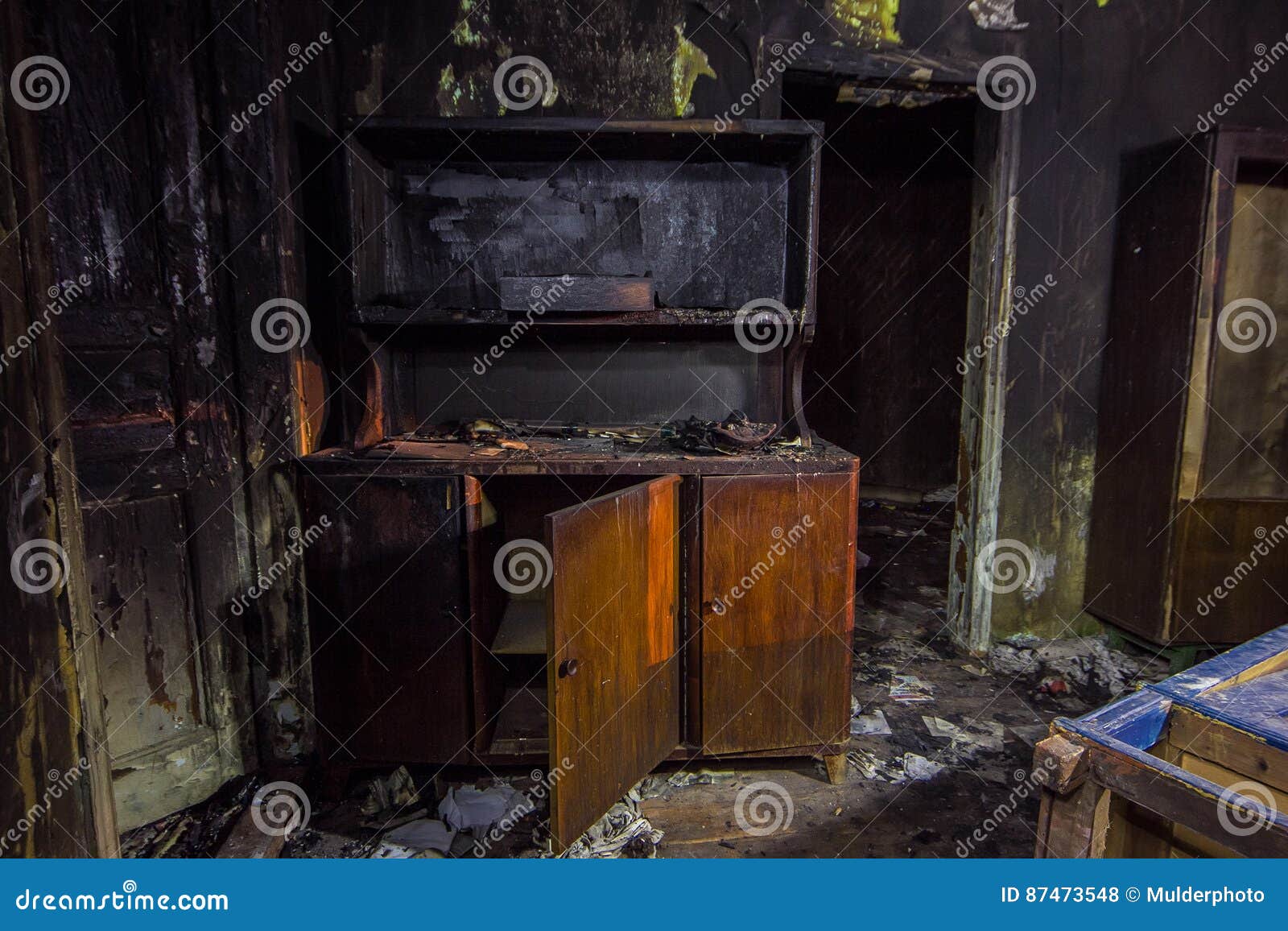 Interior of the Burned by Fire House, Burned Furniture Stock Photo