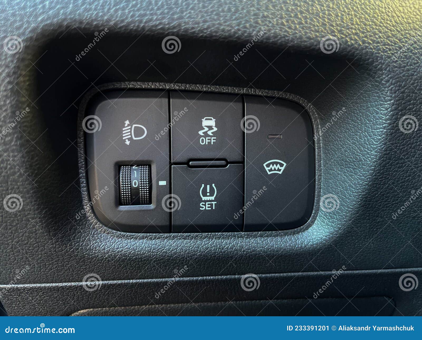 The Interior of the Car. Buttons for Adjusting the Height of the
