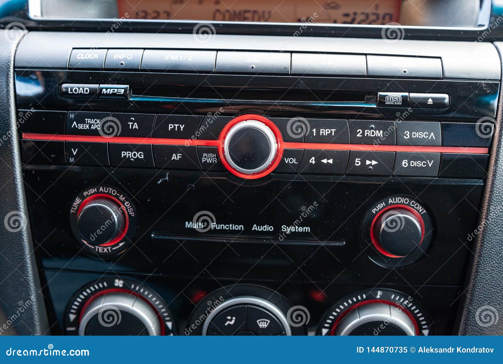 The Interior Of The Car Mazda 3 With A View Of The Dashboard