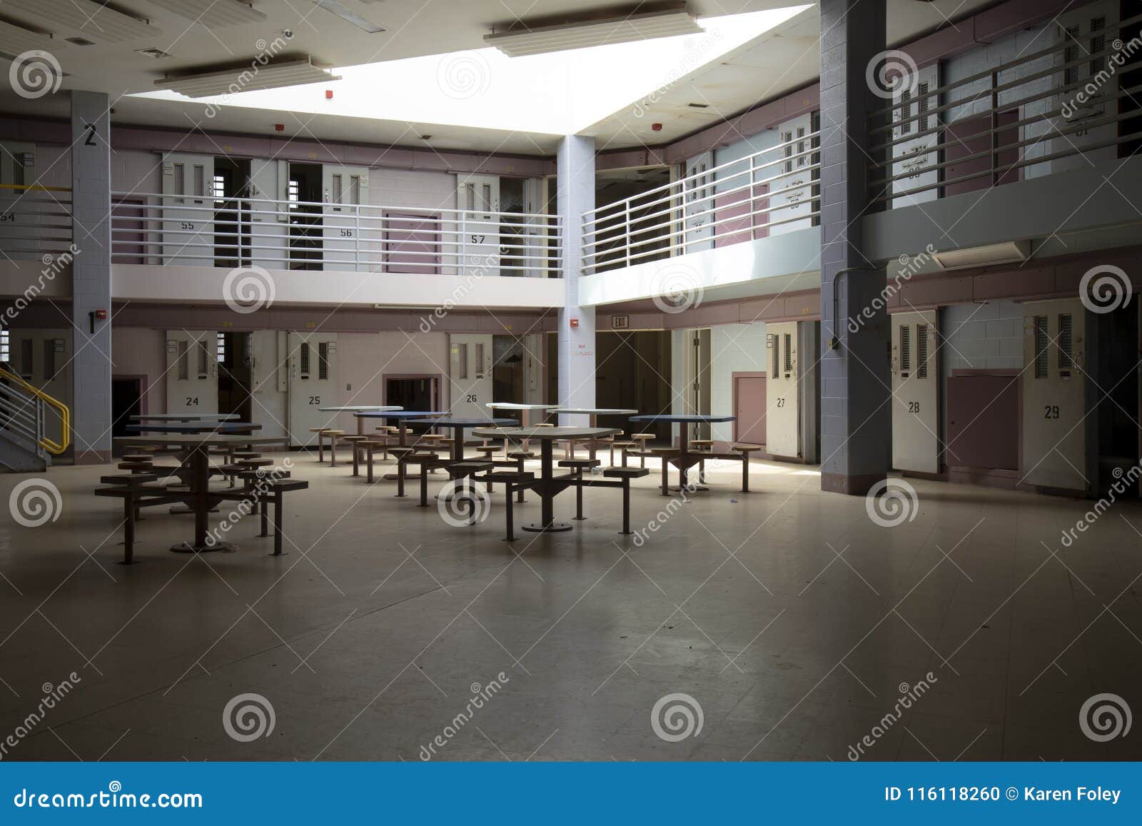 abandoned jail common room in cell block