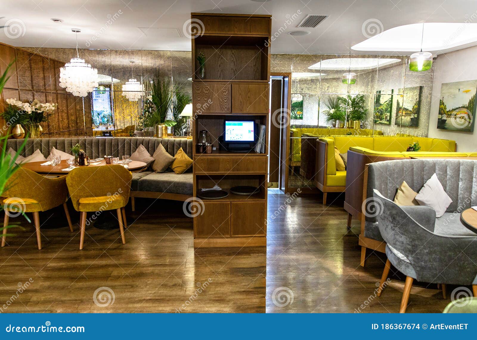 Interior of Cozy Modern Restaurant with Soft Sofas Editorial Stock