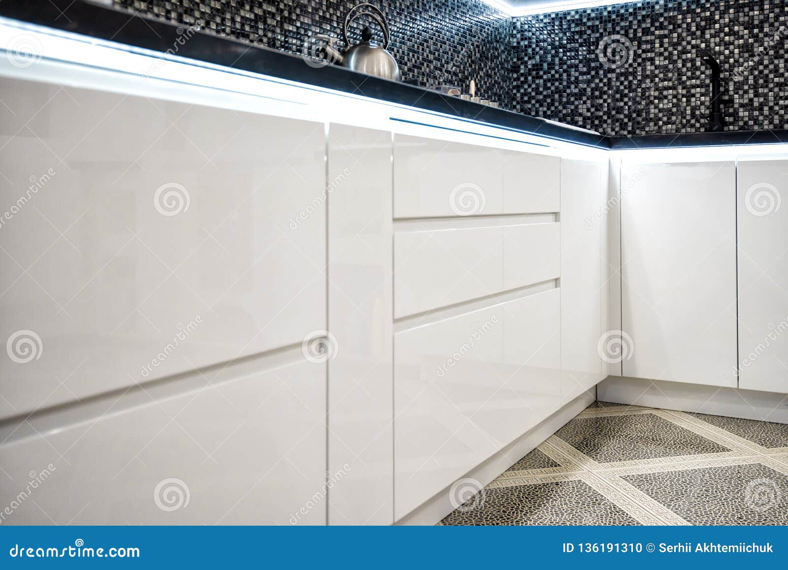 Interior Design Clean Modern White Kitchen with Painted Doors Stock