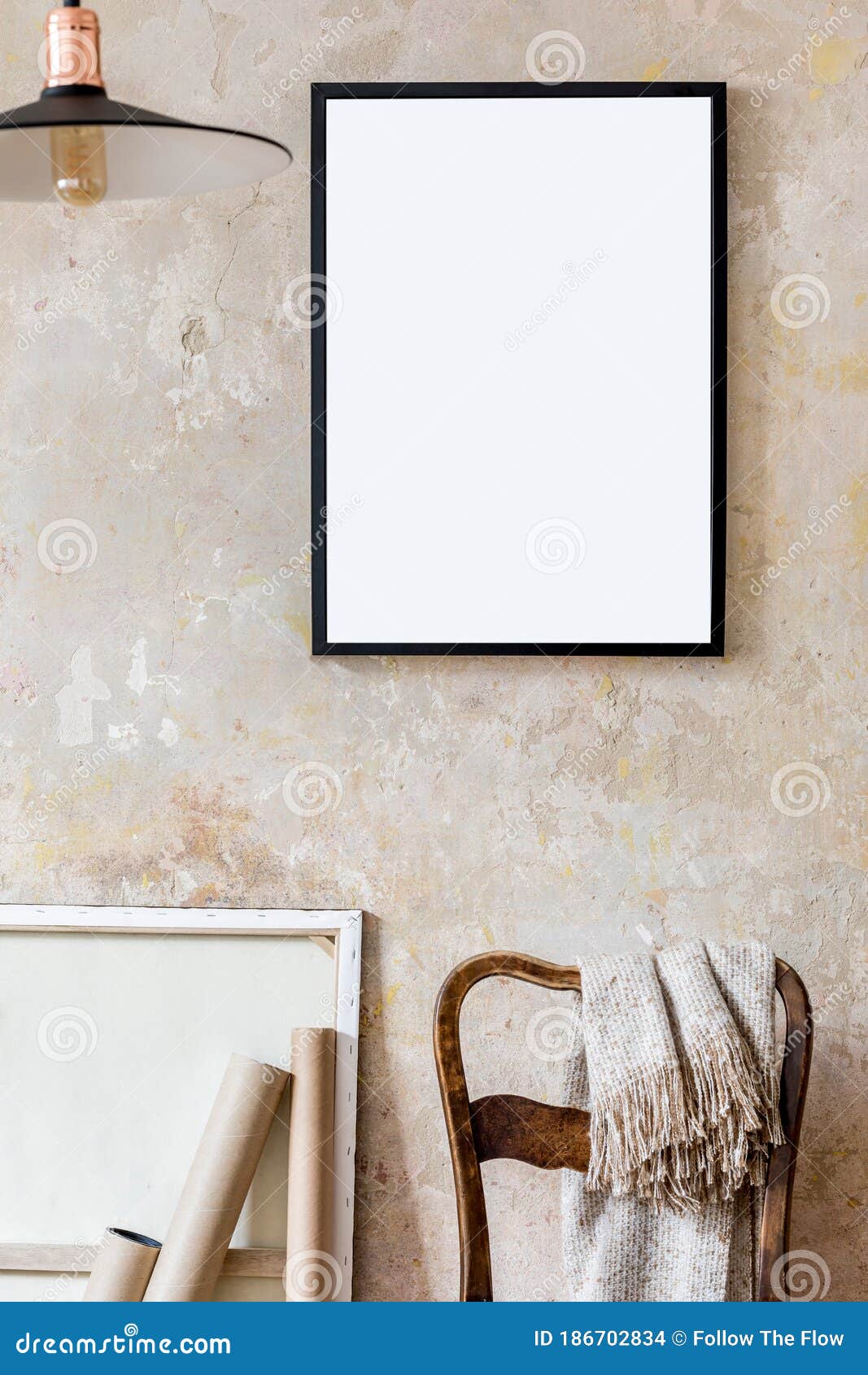 interior  of living room with black poster mock up frame, chair and elegant personal accessoreis. grunge wabi sabi wall.