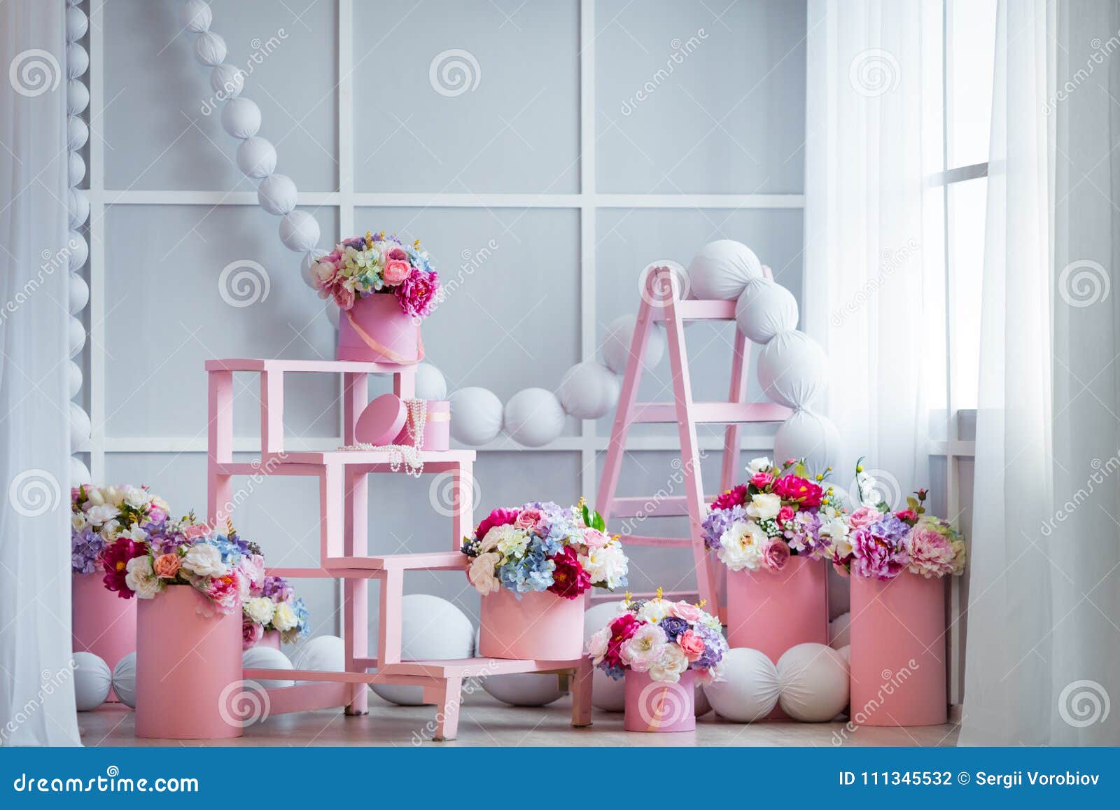 Interior Design of Room Decorated with Beautiful Flowers Stock Photo