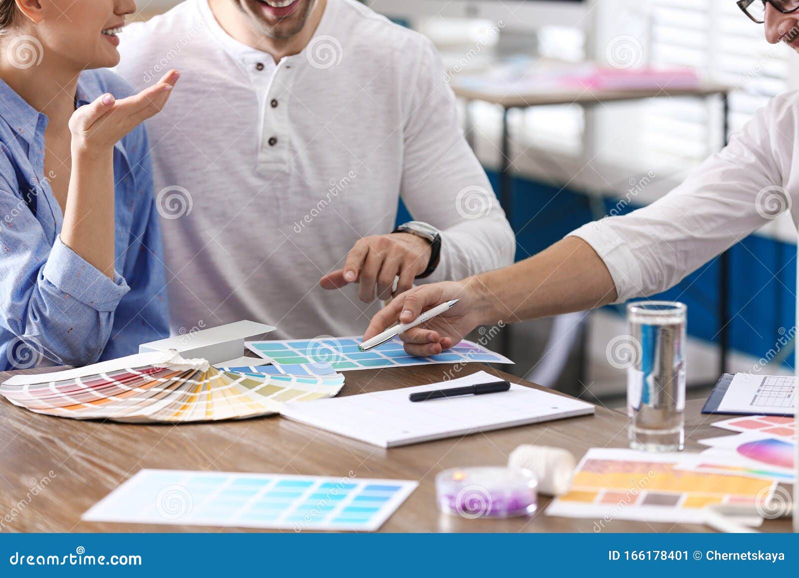Interior Designer Consulting Young Couple In Office Stock Image Image