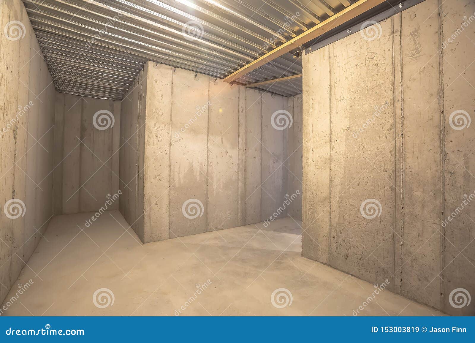 Interior Of An Empty Building With Concrete Wall And